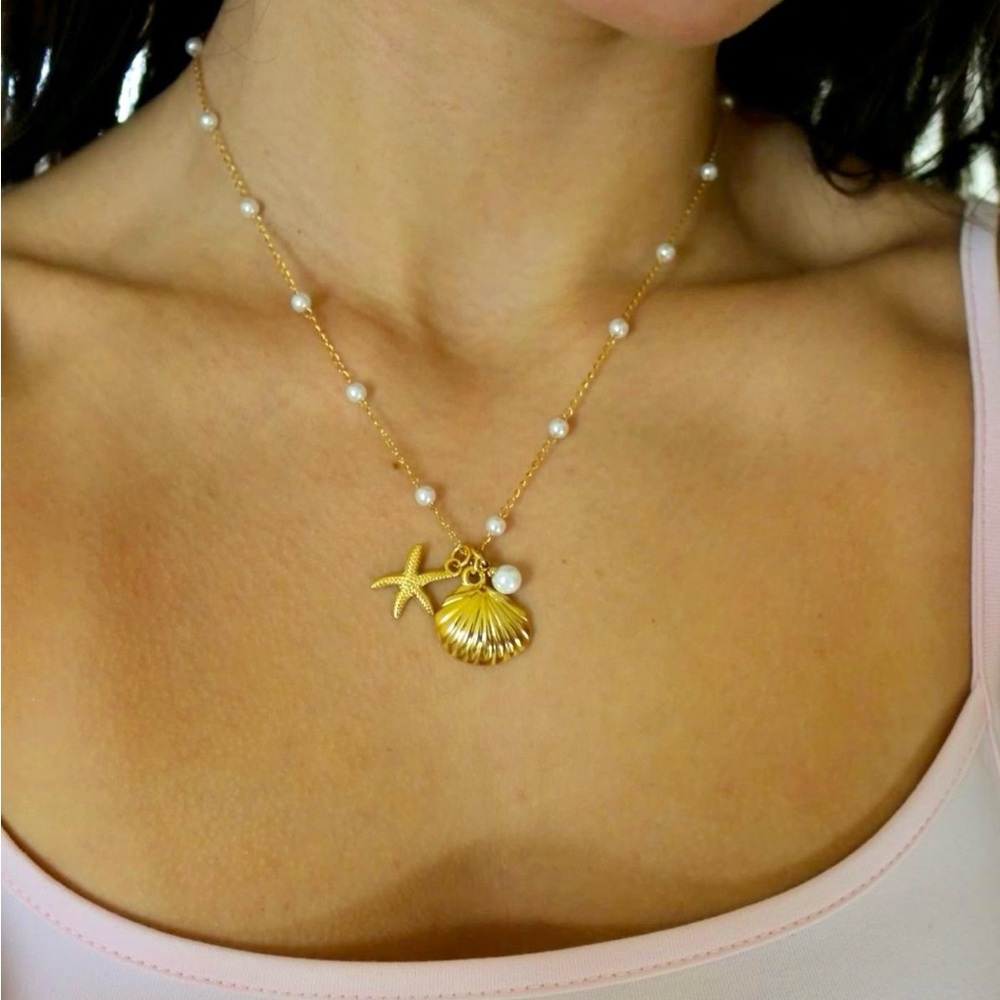18K ocean-inspired charm necklace.